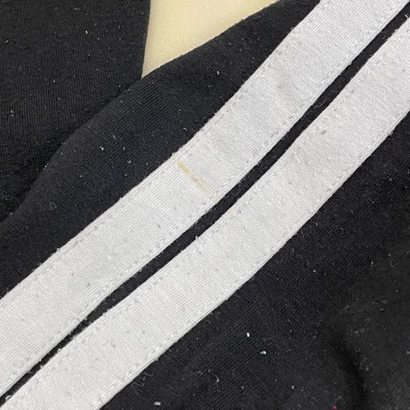 Garage black leggings with 2 white stripes on each side of the leg. - Picture 3 of 4